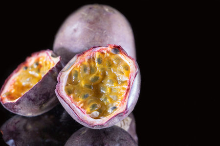 Passion fruit on a black background. Passion fruit on a black background.