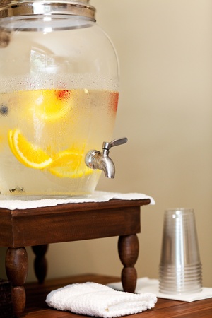 water with fruits and berries in the water dispenser in spaの写真素材