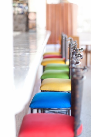 colorful bar stools at an empty barの写真素材