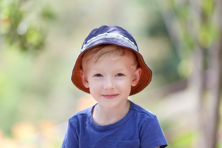 beautiful smiling boy outsideの写真素材