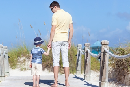 family of two at the caribbean beachの写真素材