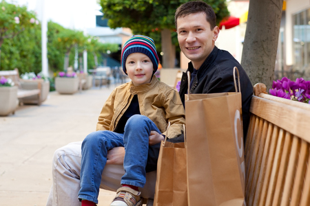 happy family of two shopping togetherの写真素材