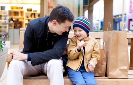 family of two having fun during shoppingの写真素材
