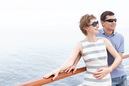 loving young couple enjoying their cruise vacation during honeymoonの写真素材