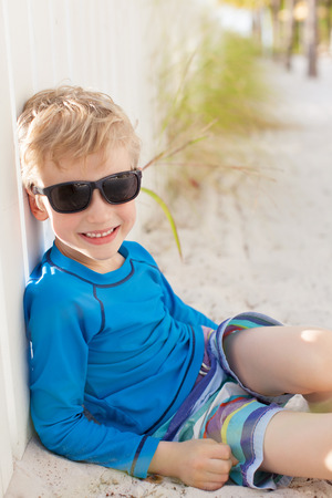 little smiling boy enjoying beach vacation at summerの写真素材