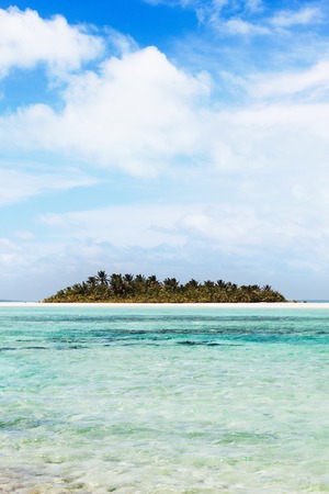 perfect tropical island with surrounding lagoonの写真素材