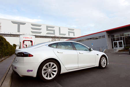 Fremont, CA - January 25, 2020: Tesla model S charging at supercharger station at Tesla factory in Fremont, the only Tesla factory in USAのeditorial素材