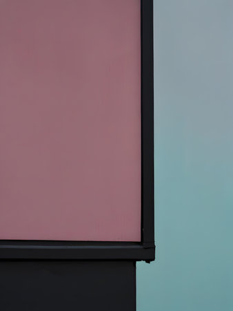 Colorful wall featuring two contrasting panels: pink and blueの素材
