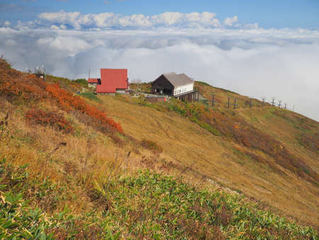 Near the end of the lift of the Happo Ridge and the blue skyの写真素材