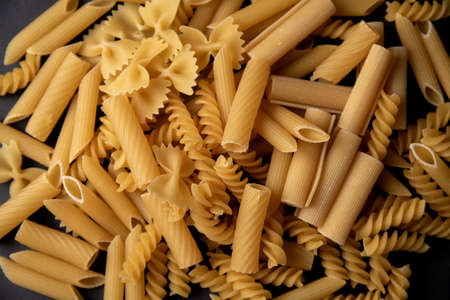 Many different types of pasta mixed together in one picture without backgroundの写真素材