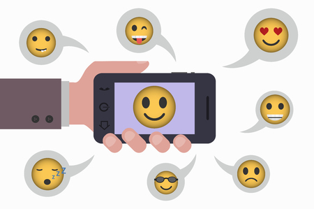 smartphone and emoticonsのイラスト素材