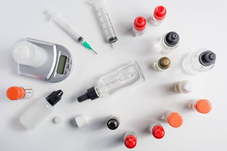 Mixing e-juice for electronic cigaretteの写真素材