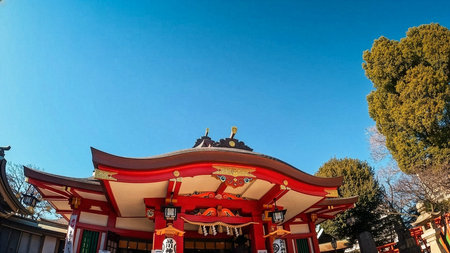 Japan, Tokyo: The torii gate and approach to Shinagawa Shrine standing under a blue sky. January 11, 2025.