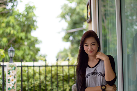 Model Women Half Portrait with Smile actionの写真素材