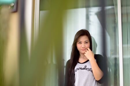 Model Women Half Portrait with Smile actionの写真素材