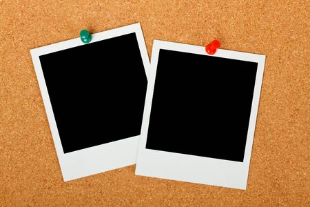 Cork bulletin board with blank instant print picturesの写真素材