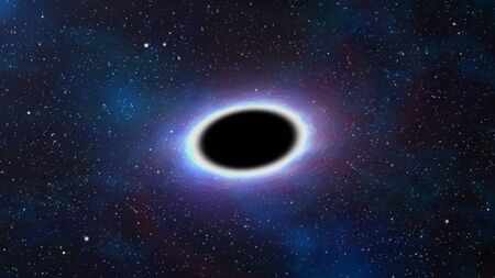 A massive black hole in space with surrounding stars being sucked in by gravitational pull.の写真素材