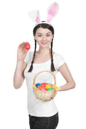 Beautiful young woman as easter bunny - spring portraitの写真素材