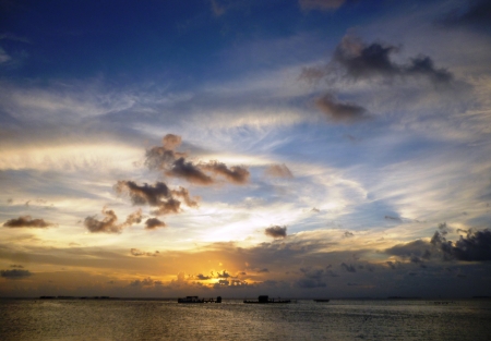 beautiful sunset at beach located on the Promontory of the island of Java Karimunの写真素材