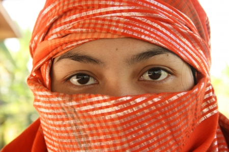 YOGYAKARTA-July 2008  a friend using custom clothes bima, west nusa southeast on July 17, 2008 in Indonesiaのeditorial素材