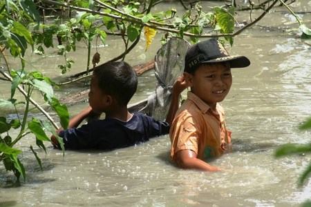 Man and boy fishing on the guttersのeditorial素材