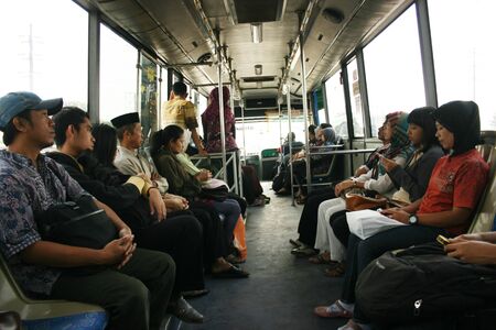  Large group of People going by bus in semarang, indonesiaのeditorial素材