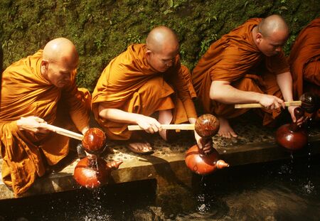 Buddhist prayer procession in the holy water when taking Jumprit ,Temanggung, Central Java , Indonesiaのeditorial素材