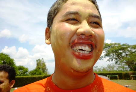 enjoying painting the face at outbond games in indonesiaのeditorial素材