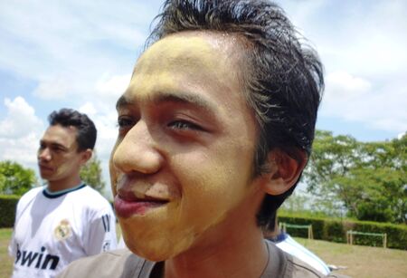 enjoying painting the face at outbond games in indonesiaのeditorial素材