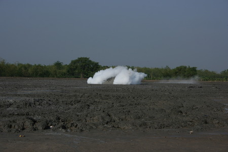 Mud volcanoe splashing with high speed in bledug kuwu, Grobogan, Indonesia