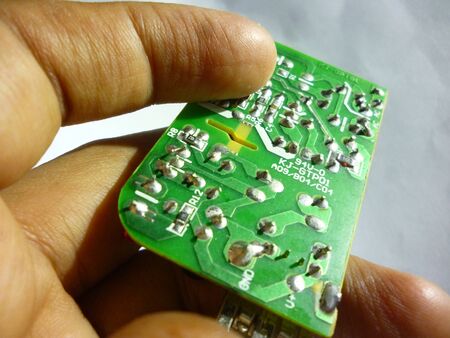 close-up of electronic circuit on handの写真素材