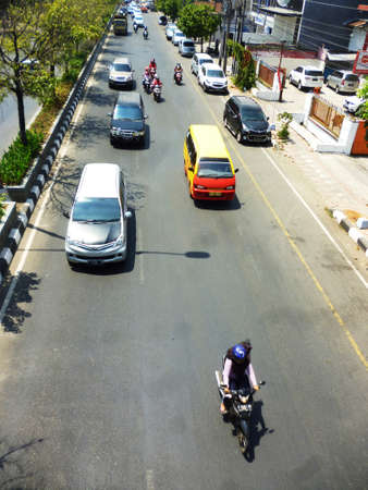 Traffic jam Cars Urban scene in semarang , central java, indonesia