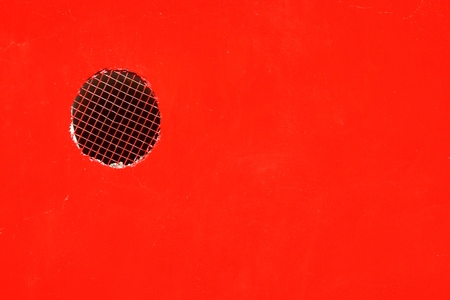 hole on a red background