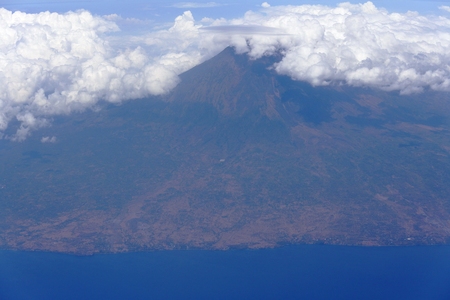 View from airplane window of Bali island, indonesiaの写真素材