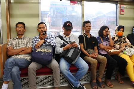 Passengers in subway train in Jakarta cityのeditorial素材