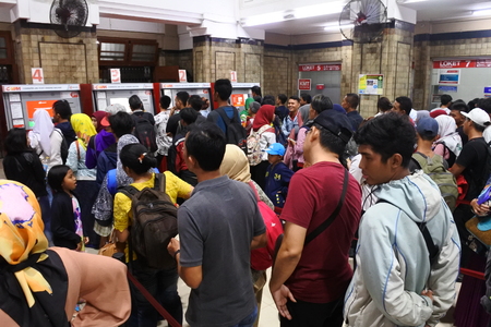 Jakarta November 4, 2017: passenger commuter line passengers buy a passenger card at the jakarta kota stationのeditorial素材