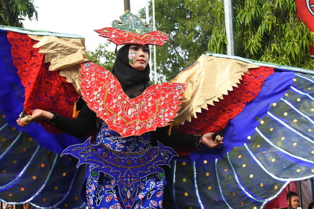 Blora, Indonesia - December 16, 2017: Spectacular Costumes worn by Participants in Blora Batik Carnival, Central Java, Indonesiaのeditorial素材