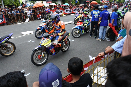 the atmosphere of the drivers during the road race in Blora, Central Javaのeditorial素材