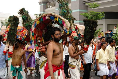 Penang, Malaysia, Feb 2 2009. Indian devotees carrying kavadis in the annual Thaipusam festival.のeditorial素材