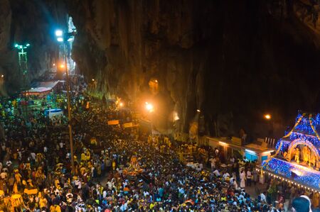 20 January 2011, Kuala Lumpur, Malaysia: Over a million people gather at the Batu Caves for the annual Thaipusam festival, culminating at the temple within the massive cave complex.のeditorial素材