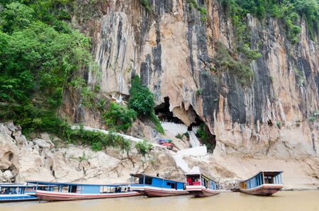 The Pak Ou Caves, known as the Cave of a Thousand Buddhas, are located on a cliff along the Mekong river, some 20 km north of Luang Prabang.の写真素材