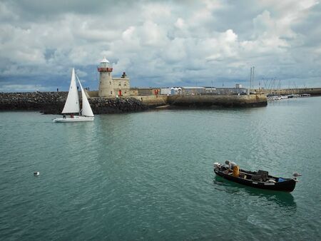 Lighthouse on the pier of Howth, Irelandの写真素材