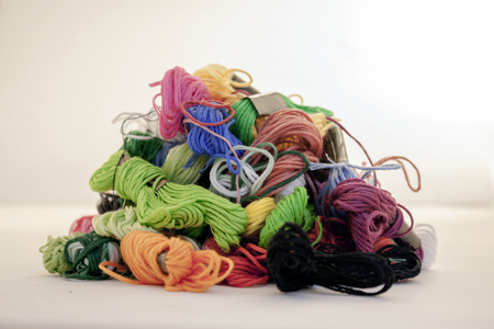 big amount of different colour and dimensions threads
