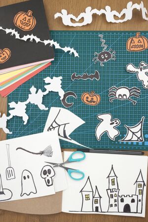 a vertical overhead view of a scene of drawing halloween decorationsの写真素材