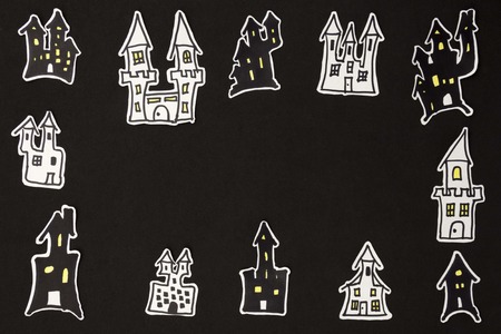 a horizontal overhead view of a Halloween frame made by housesの写真素材