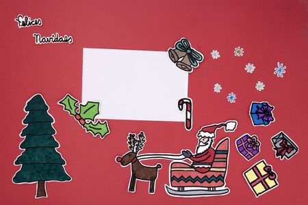 a horizontal overhead view of a scrapbook xmas layout with a Happy xmas message in Asturianの写真素材