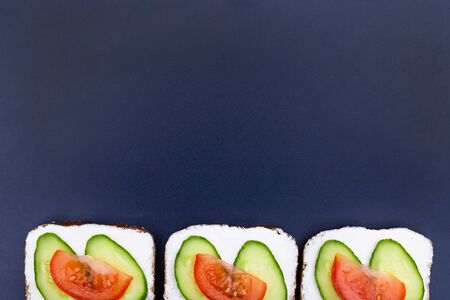 Sandwich menu concept, summer sandwiches on black background, with copy space, top view.の写真素材