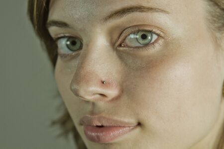 Closeup of Contemplative Young Womanの写真素材