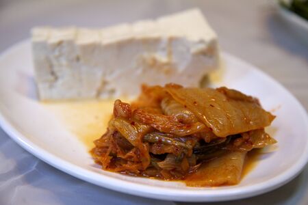 White Porcelain Plate of Kimchi and Tofuの写真素材
