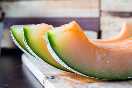cantaloupe melon slicesの写真素材